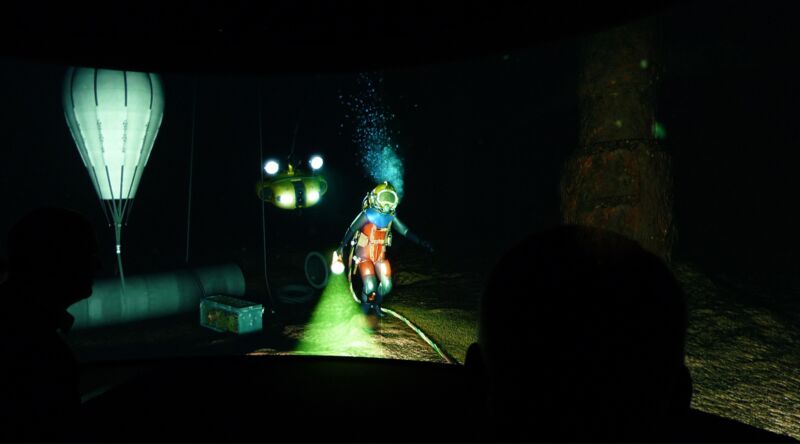 immersive digital experience showing a diver in the deep ocean