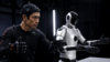 A man in a motion capture suit alongside a robot
