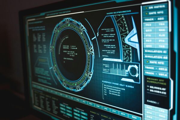 Futuristic screen featuring a variety of symbols in a variety of cold colours