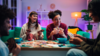 Group of friends playing card game