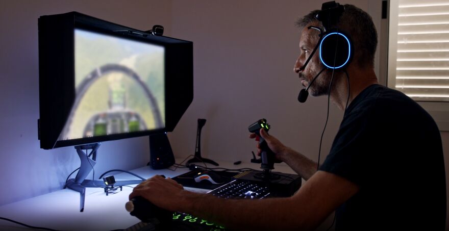 A man playing games on a computer
