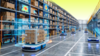 A self driving vehicle loaded with boxes driving through a warehouse