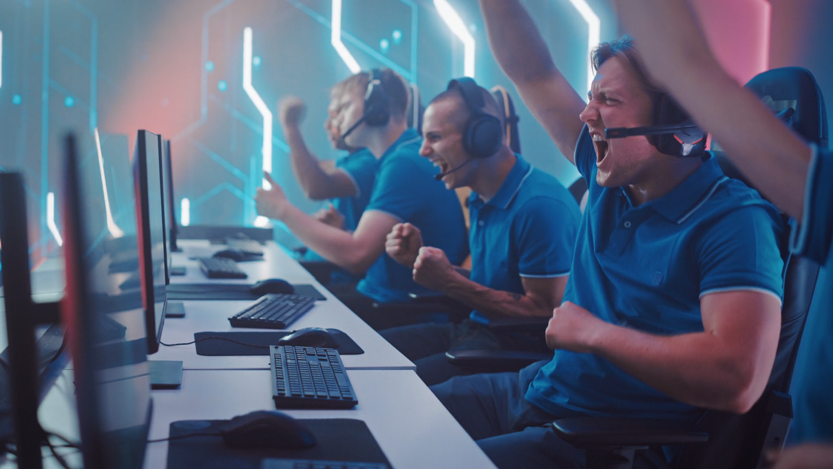 A team of gamers cheering