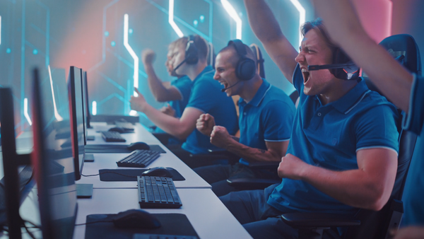 A team of gamers cheering