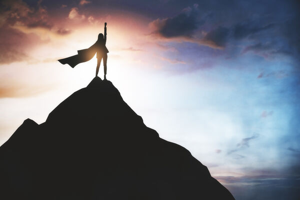 Superhero_standing_on_mountain