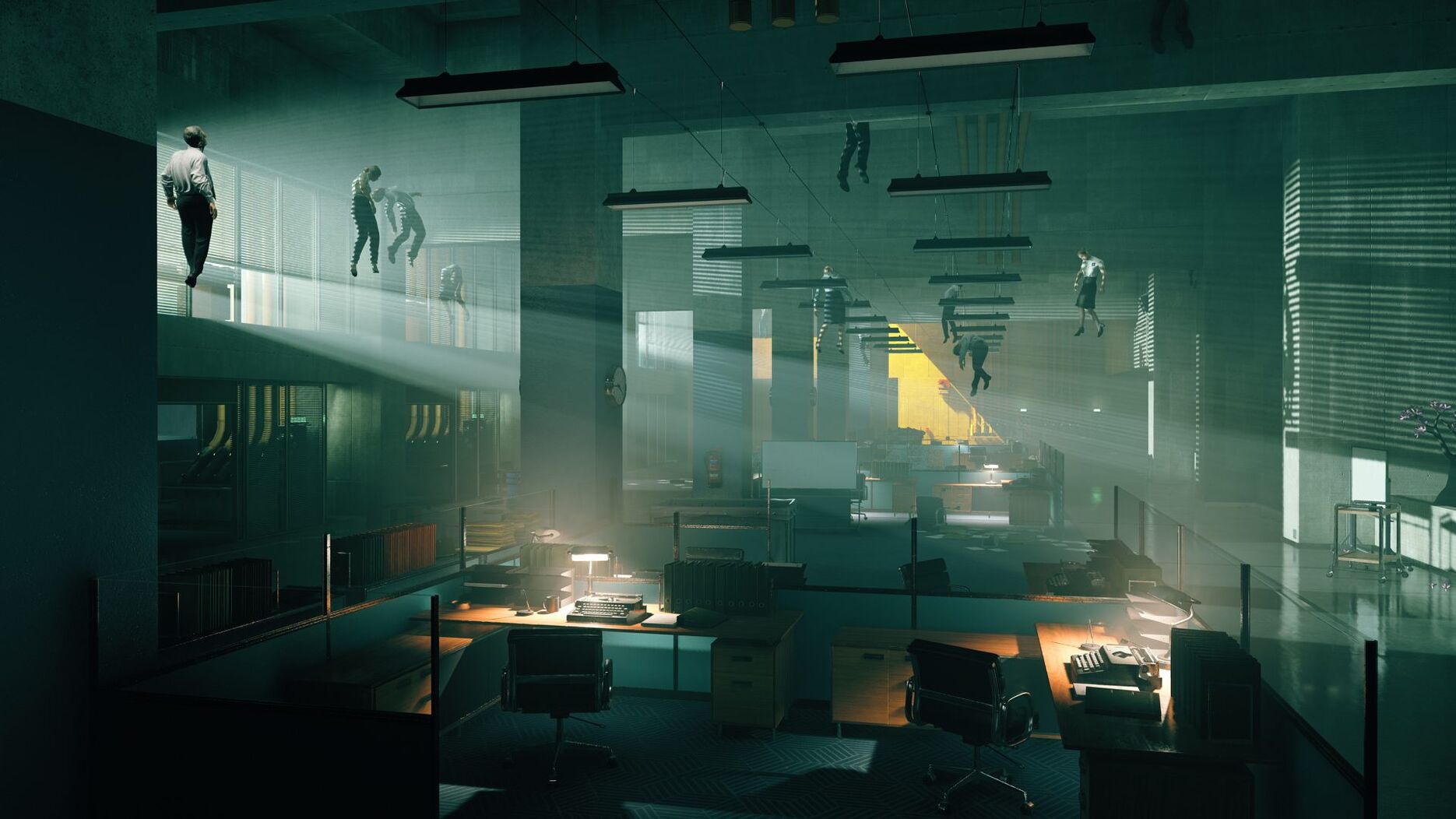 A large, dark room with daylight coming in from windows to the left. Several people are floating.
