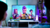 A TV screen showing a shot from Kpop demon hunters