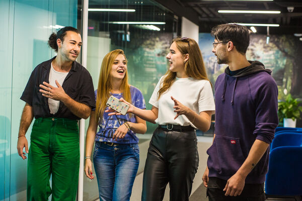 Four people talking