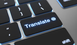 a photo keyboard with the term translate